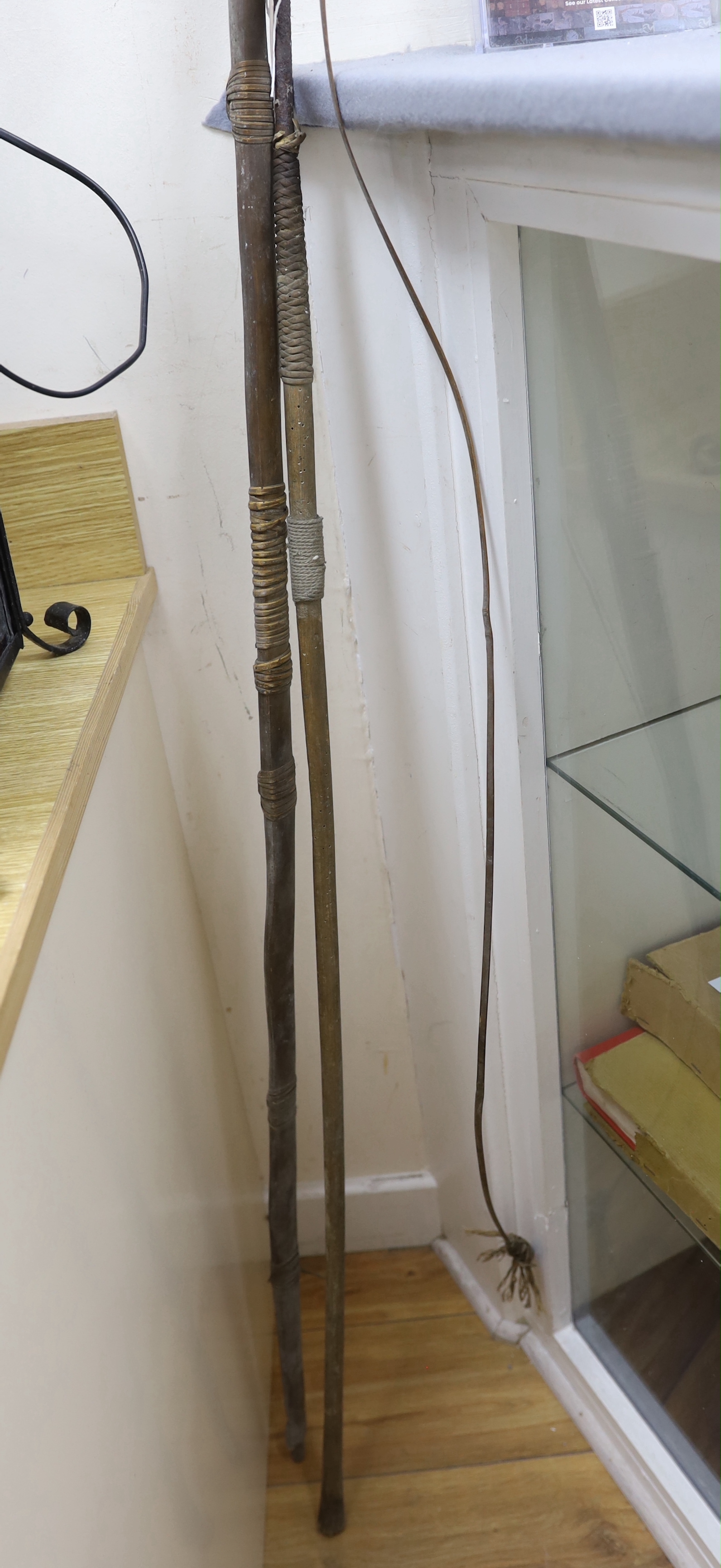 A Zulu type bow and throwing spear, bow 166cm long